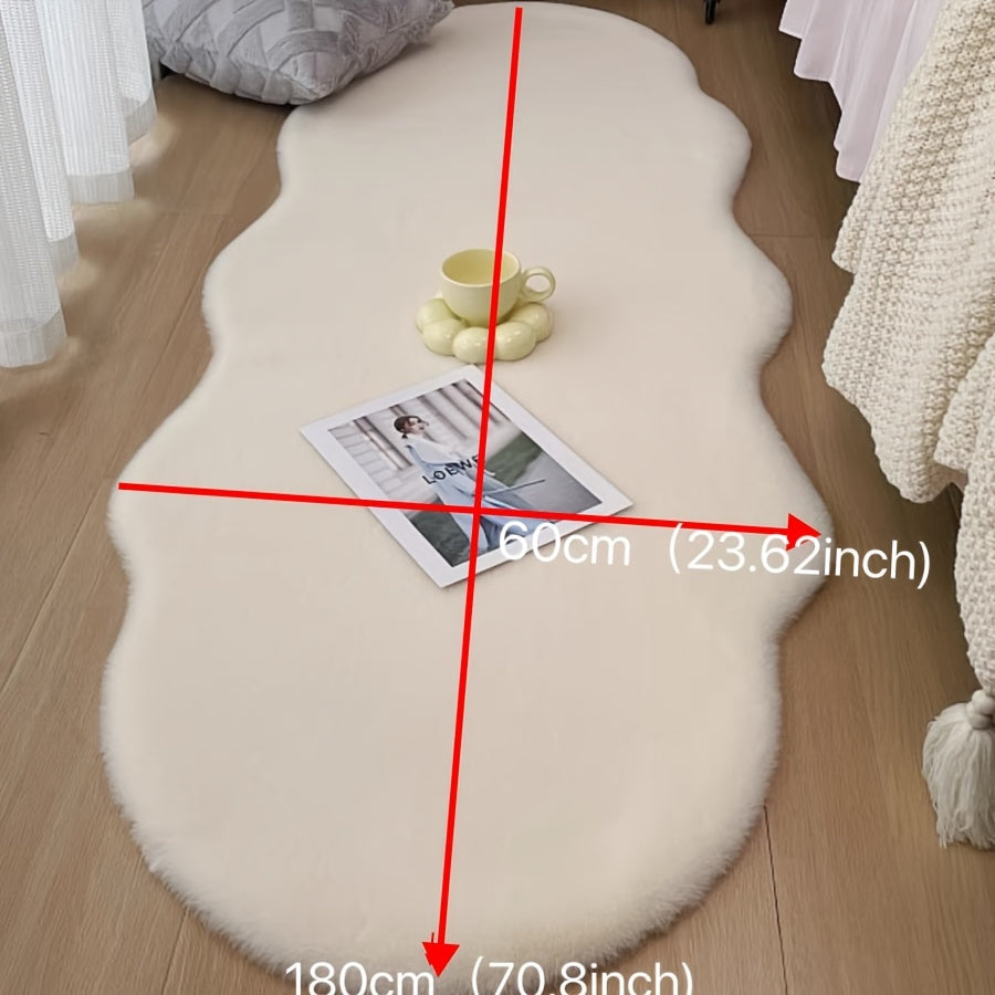 Pamper your space with this gorgeous Faux Rabbit Fur Area Rug, known for its luxurious softness and plush feel. This stain-resistant beauty is perfect for enhancing the decor of your bedroom or living room. Its unique shape adds style to any room, but