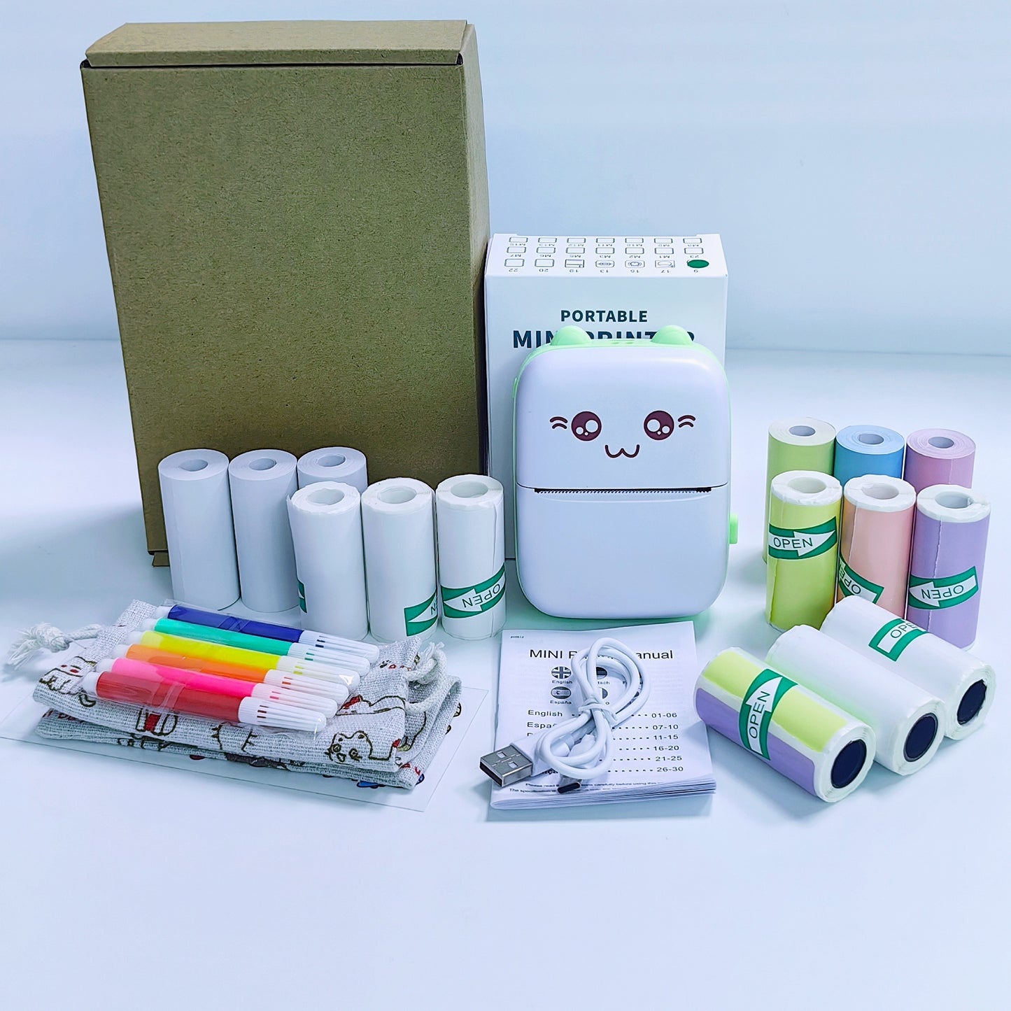 Set up C9 green mini portable thermal wireless pocket printer with 3 rolls of thermal, self-adhesive, colored, colored self-adhesive, and label paper; it prints pictures, photos, labels