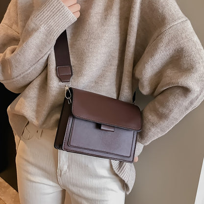 Retro crossbody bag for women in stylish brown with adjustable strap and metal ring detail. Features a compact flap design for everyday use.