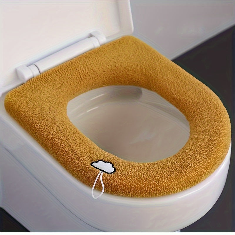 Soft, warm plush toilet seat cover for all seasons. Perfect bathroom accessory or holiday gift.