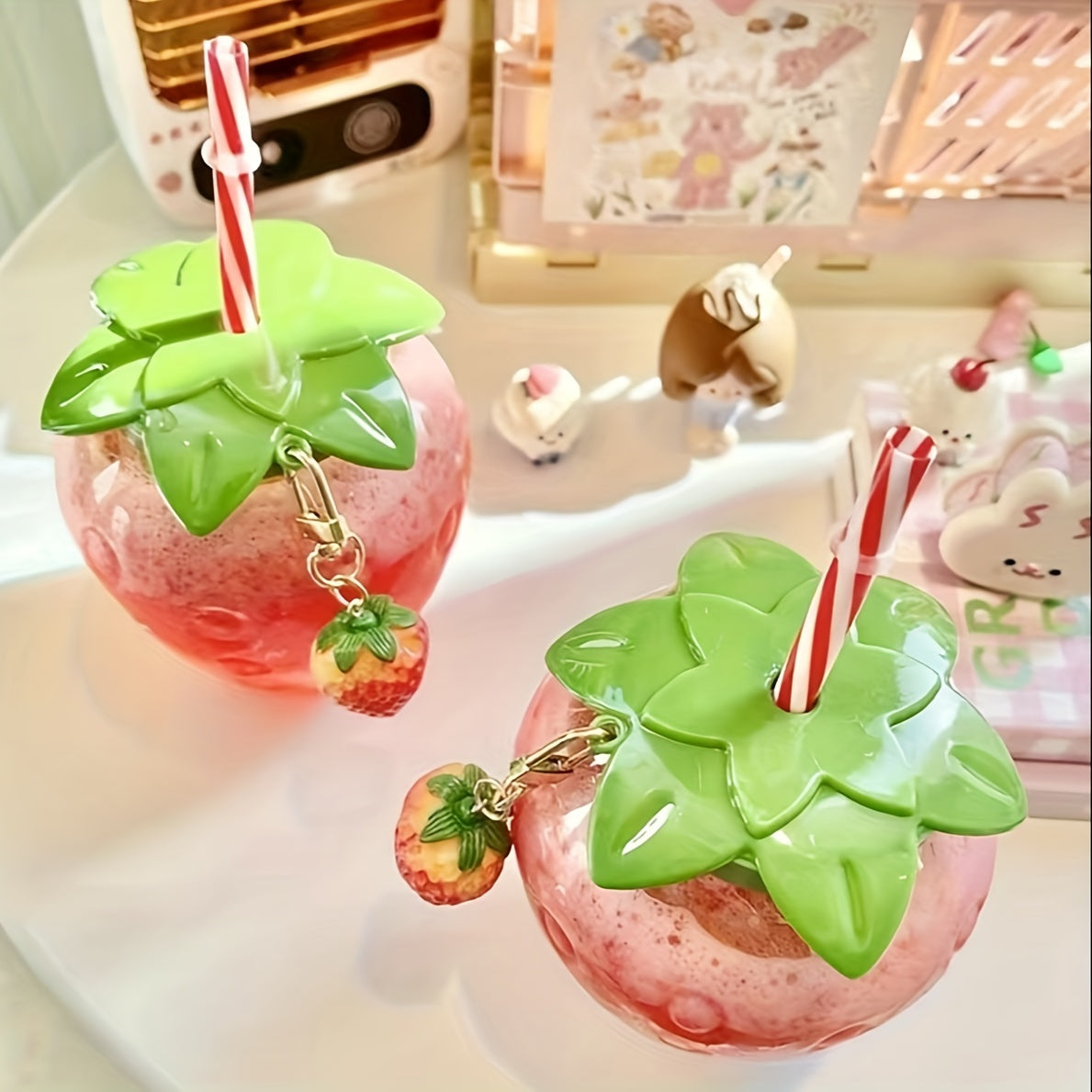 Cute transparent strawberry tumbler with lid and straw, perfect for milk tea or fruit drinks. Great for parties and on-the-go.