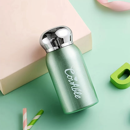 Small stainless steel vacuum flask with electroplated lid for on-the-go hydration. Ideal for students.