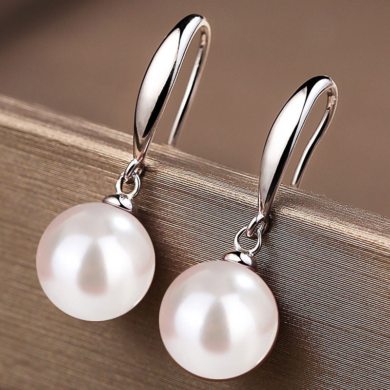 Give the gift of elegance with these stunning S925 Sterling Silver earrings featuring large natural green pearls measuring 12mm. Perfect for your daughter, girlfriend, wife, mother, or friends, these earrings are ideal for any occasion, from parties and