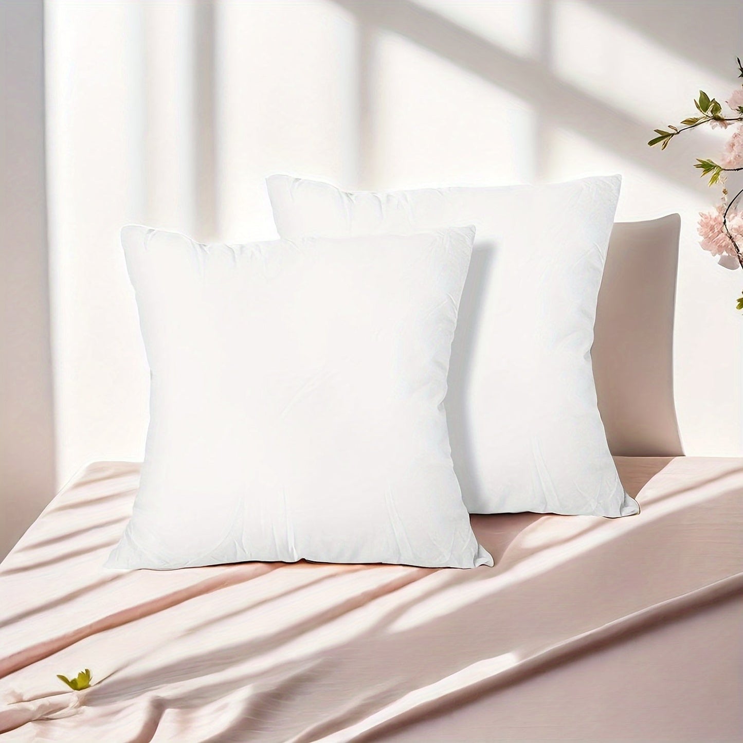 Soft, fluffy square pillow inserts with zipper closure available in sets of 1, 2, or 4. Made with 100% machine washable polyester cover material and filled with 100% polypropylene. These white-colored pillows are suitable for all seasons and can be used