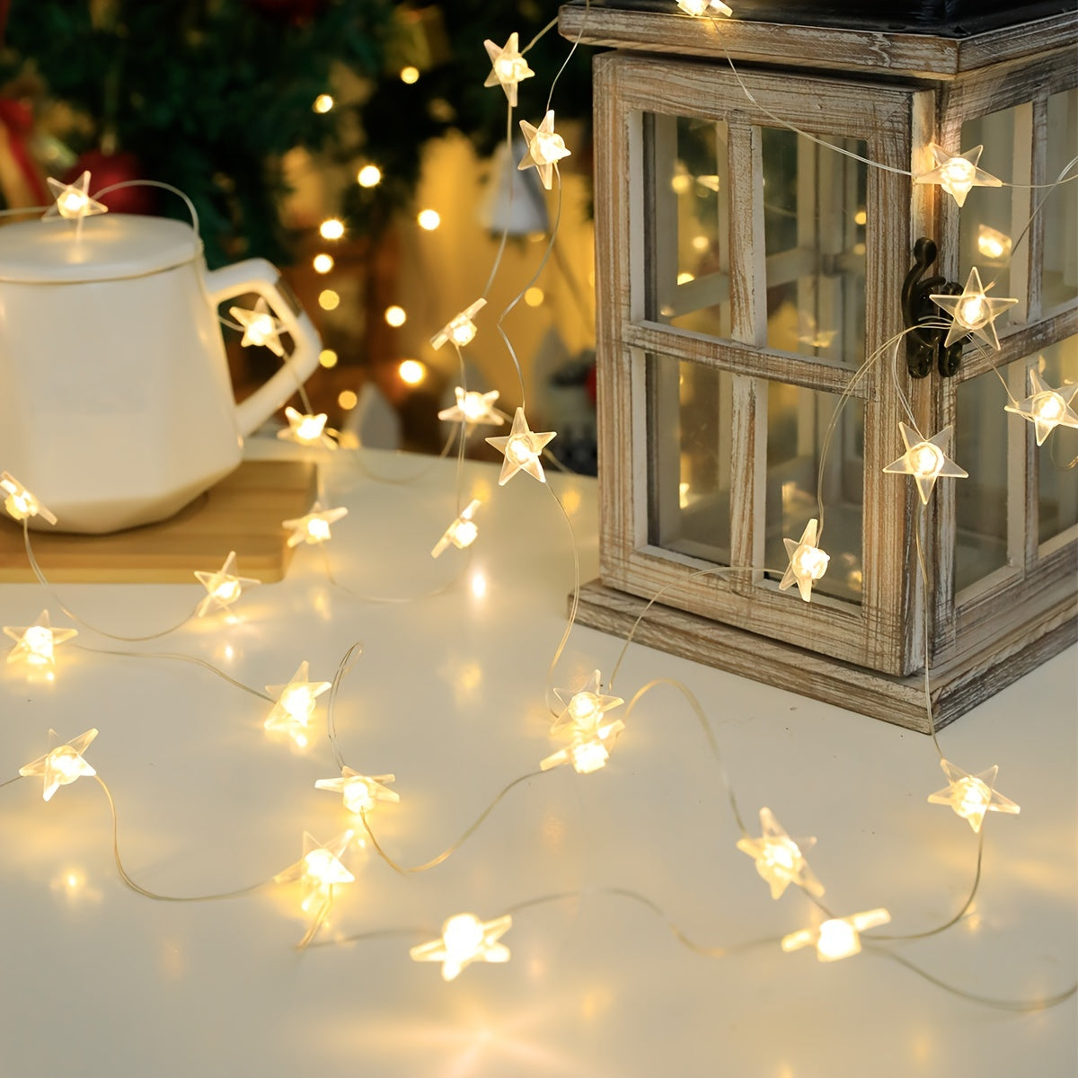 Star-shaped LED fairy lights in modern copper wire designs are available in 1m, 2m, and 3m lengths with 10, 20, and 30 LEDs respectively. Designed for universal holiday decor, these lights are battery operated and do not contain feathers.