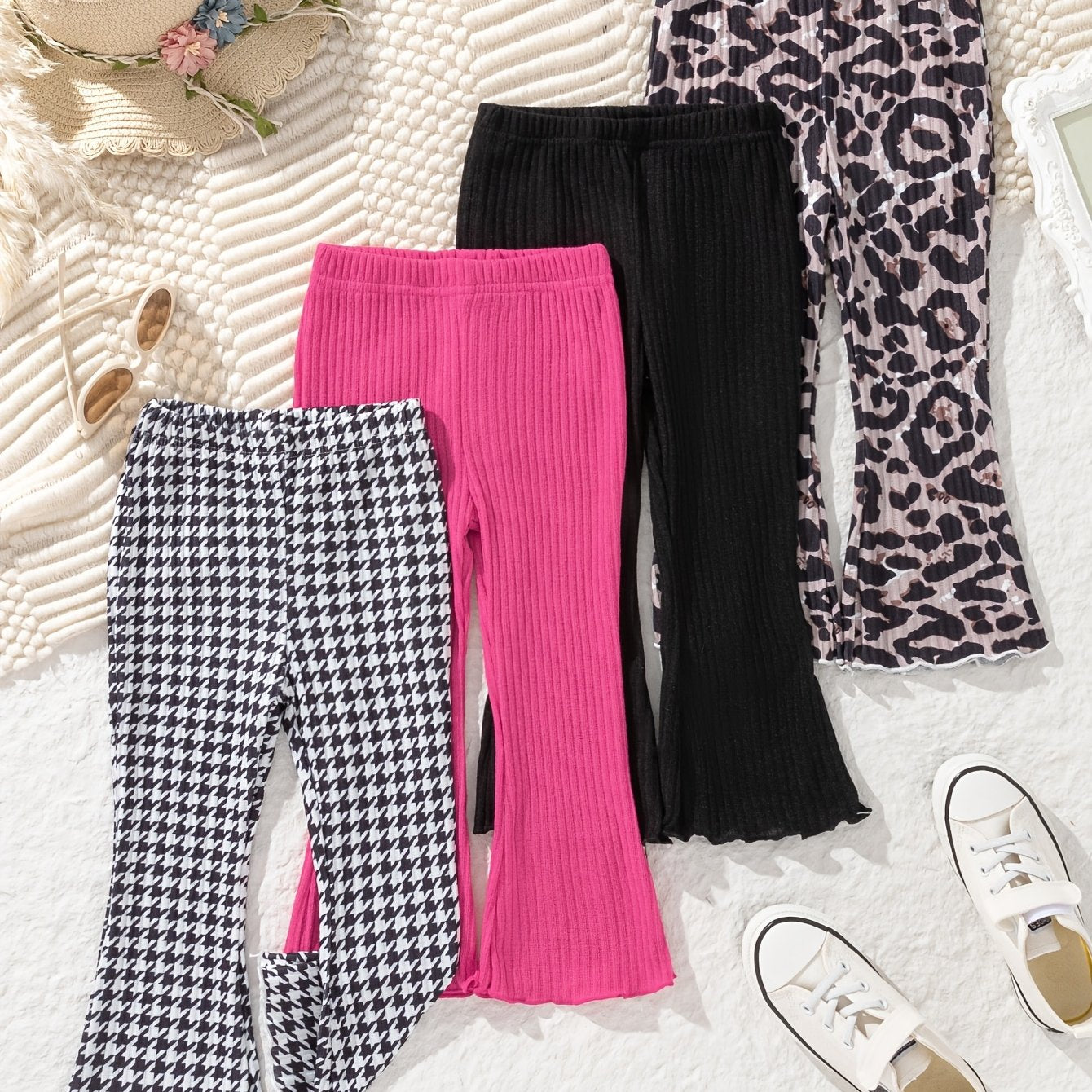 4 stylish girls' casual pants in houndstooth, leopard print, and solid colors. Made of polyester, machine washable. Ideal for spring/fall and outdoor wear.