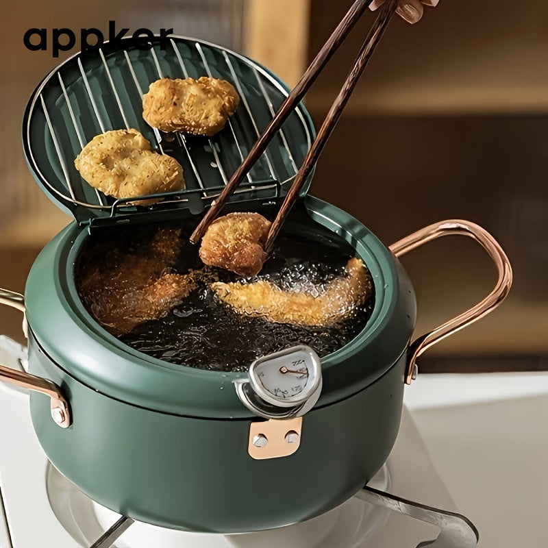 Japanese tempura fryer for easy frying, featuring a Fahrenheit thermometer and non-stick carbon steel construction. Ideal for tempura, chicken, fish, and shrimp. This large green pan is easy to clean and comes with a lid and oil drip drain rack. Perfect