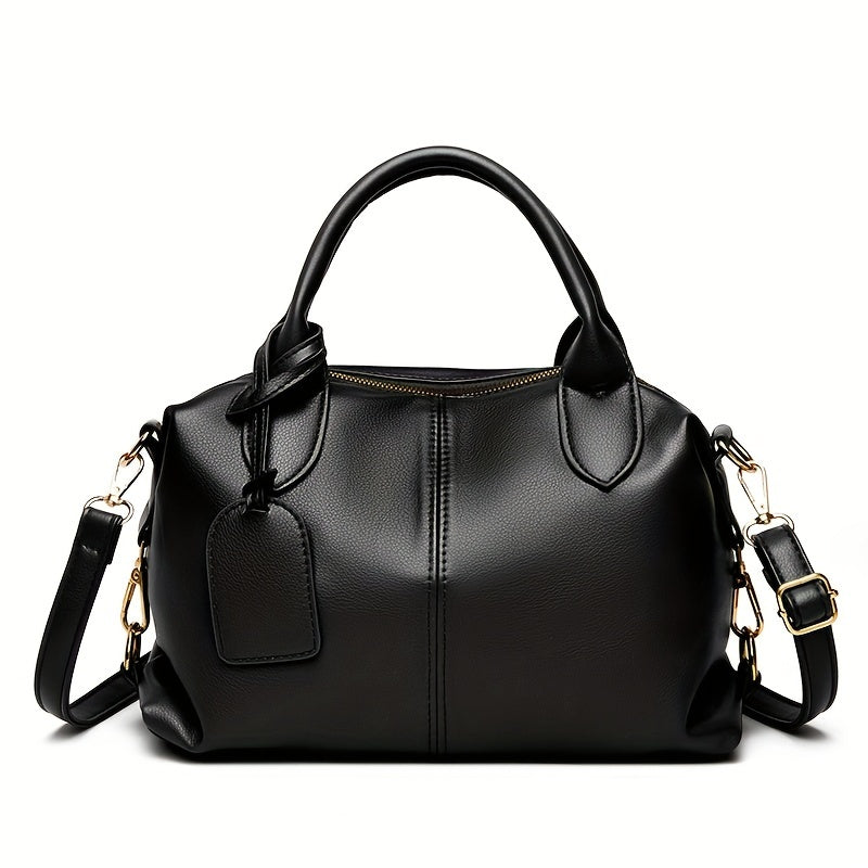 Stylish shoulder bag with removable strap and zip closure, perfect for everyday use.