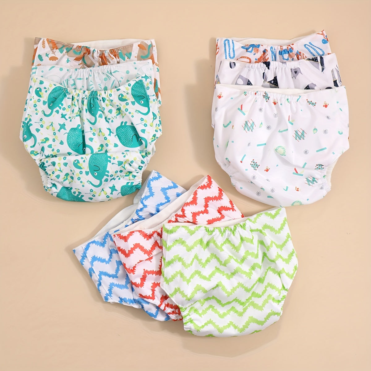 3-Pack of Baby and Toddler Training Pants - Waterproof Cotton Diaper Covers featuring Snaps, Printed Adjustable Cloth Diapers suitable for Newborns up to 3 Years Old, Absorbent and Reusable Nappy Pants