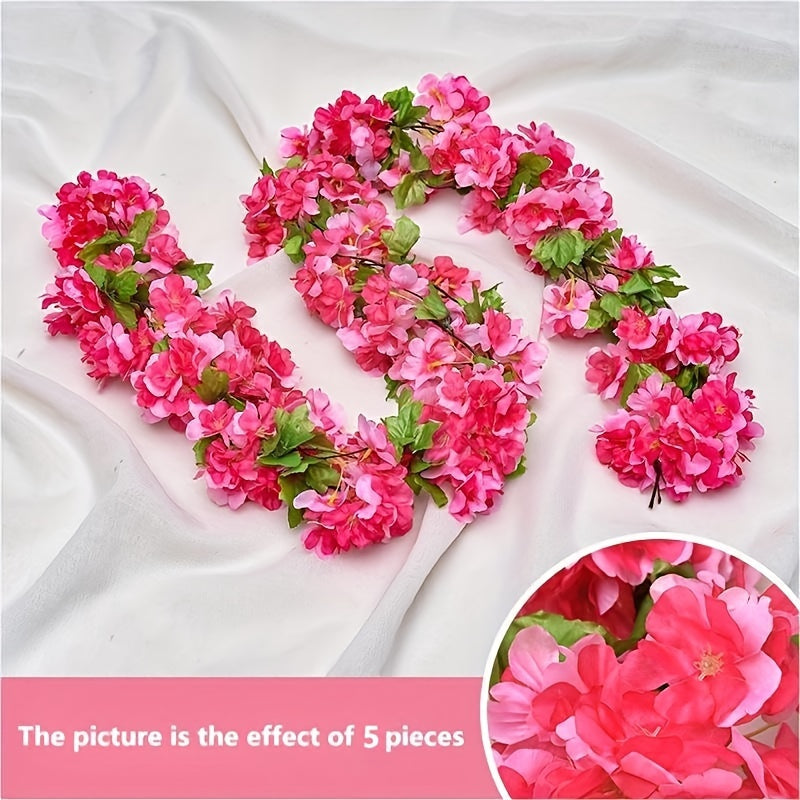 Elegant artificial cherry blossom vine, ideal for home, party, wedding, and garden decor.