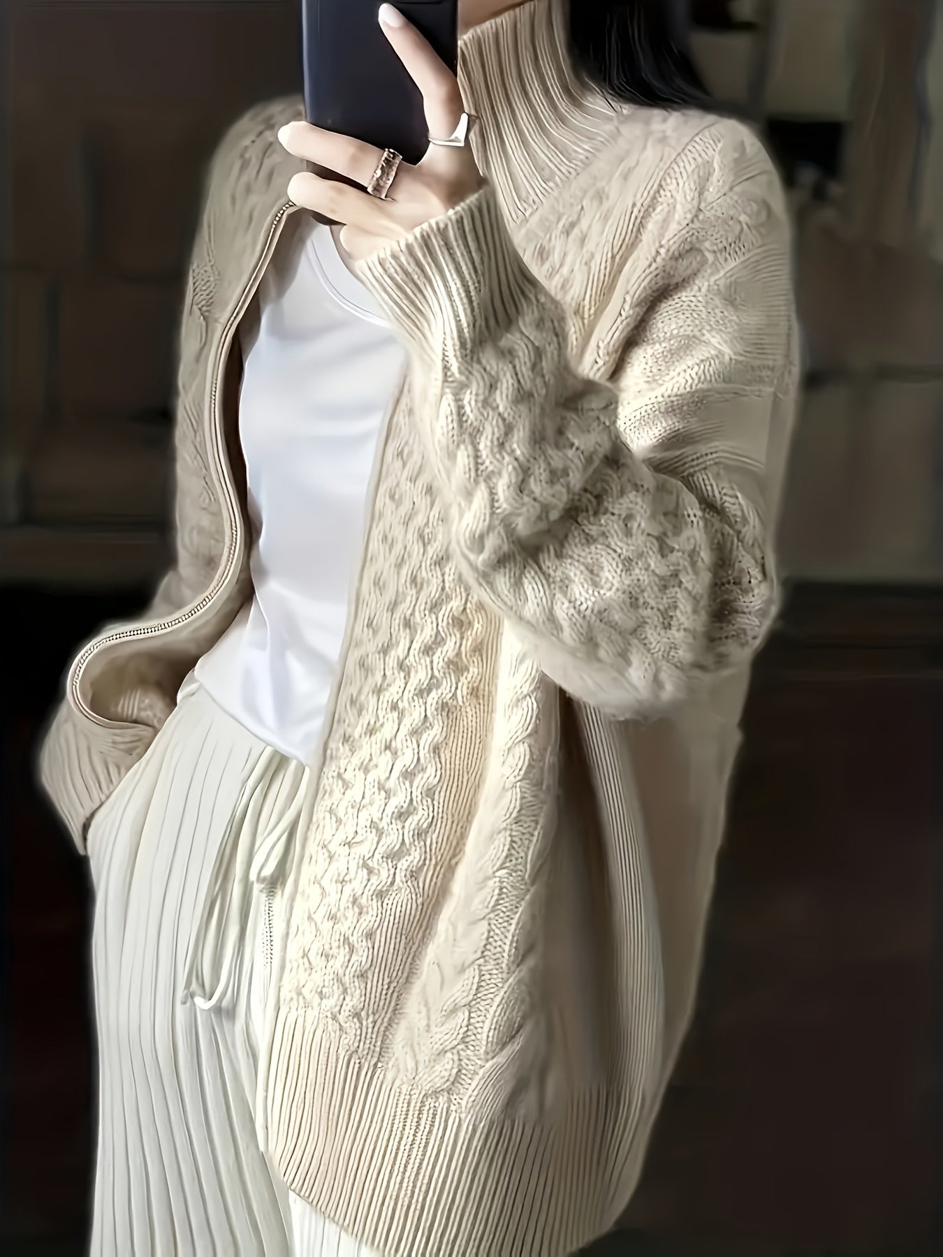 Women's casual high neck solid color polyester sweater with zipper, slight stretch, and loose fit for fall/winter.