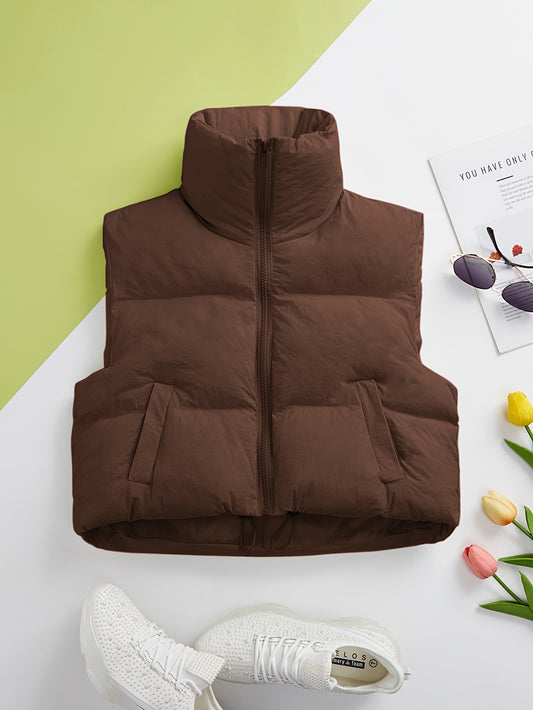 Women's solid zip-up puffy vest with casual sleeveless pockets, perfect for fall and winter.