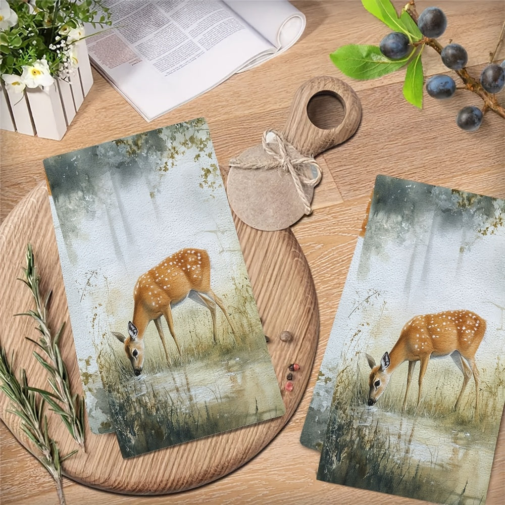 Set of 2 Ultra Soft Kitchen Towels featuring a Serene Deer Grazing Scene. These highly absorbent and machine washable dish hand towels are in a Contemporary Style, measuring 40.64x60.96 cm. Perfect for Holiday Decor and ideal for use as dish towels.