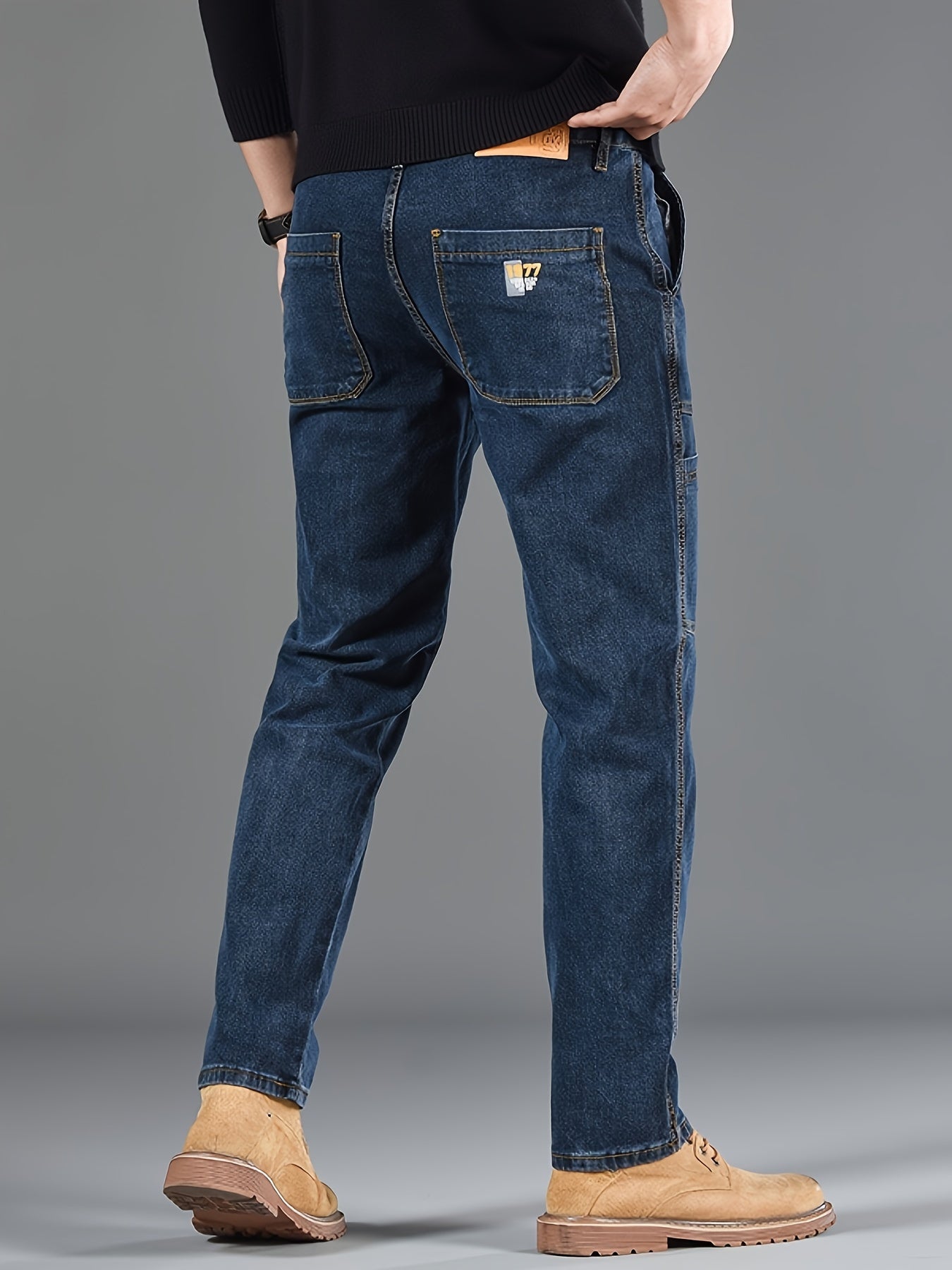 Men's regular fit denim jeans made of 70% cotton, 28% polyester, and 1.3% elastane with washed print, slight stretch, and 300g/m² woven fabric. Suitable for all seasons.