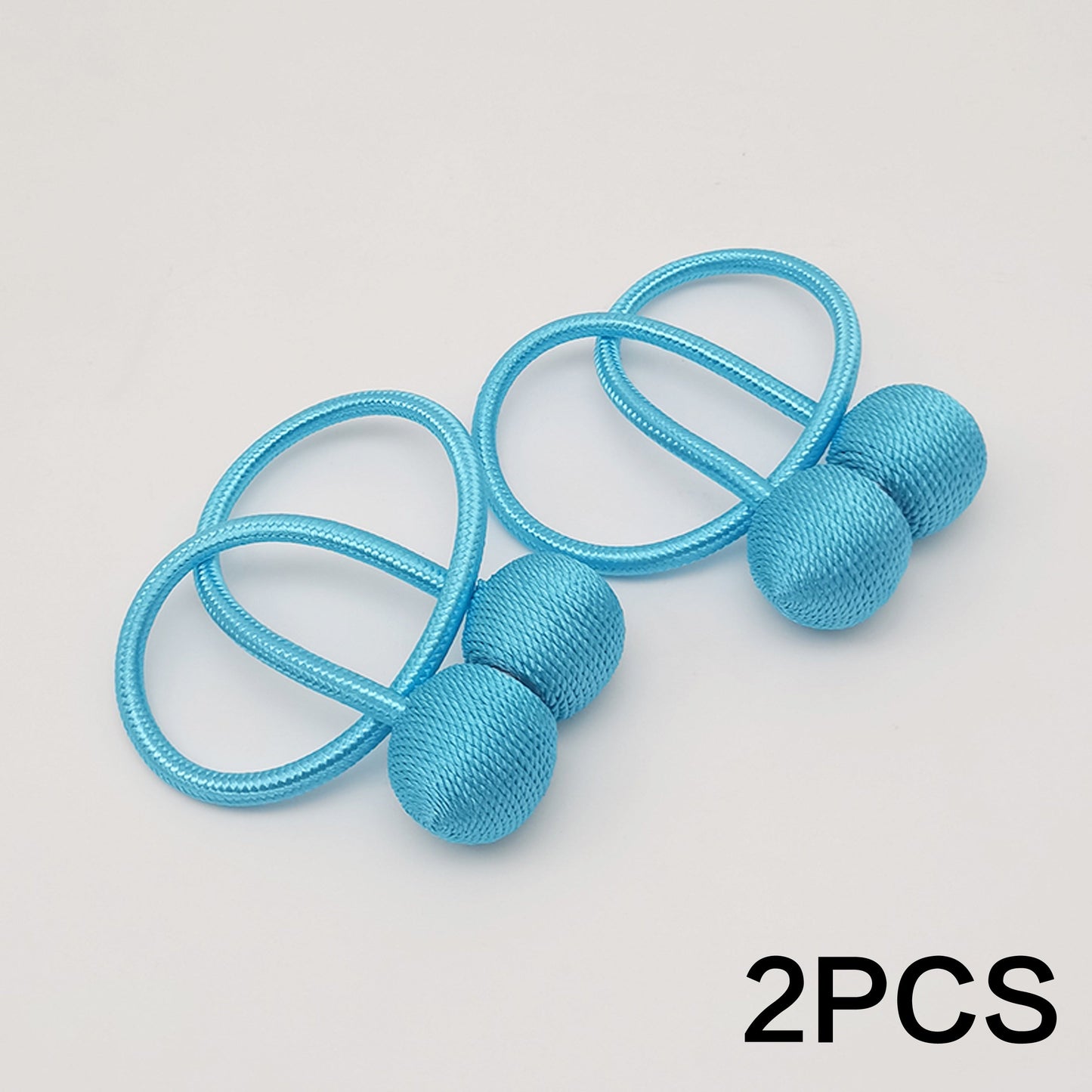 Get your hands on a set of two Classic Style Magnetic Curtain Tiebacks. These tiebacks are designed to be durable and easy to install without any drilling required. Made from polyester twisted rope, they feature a strong magnetic hold to secure your