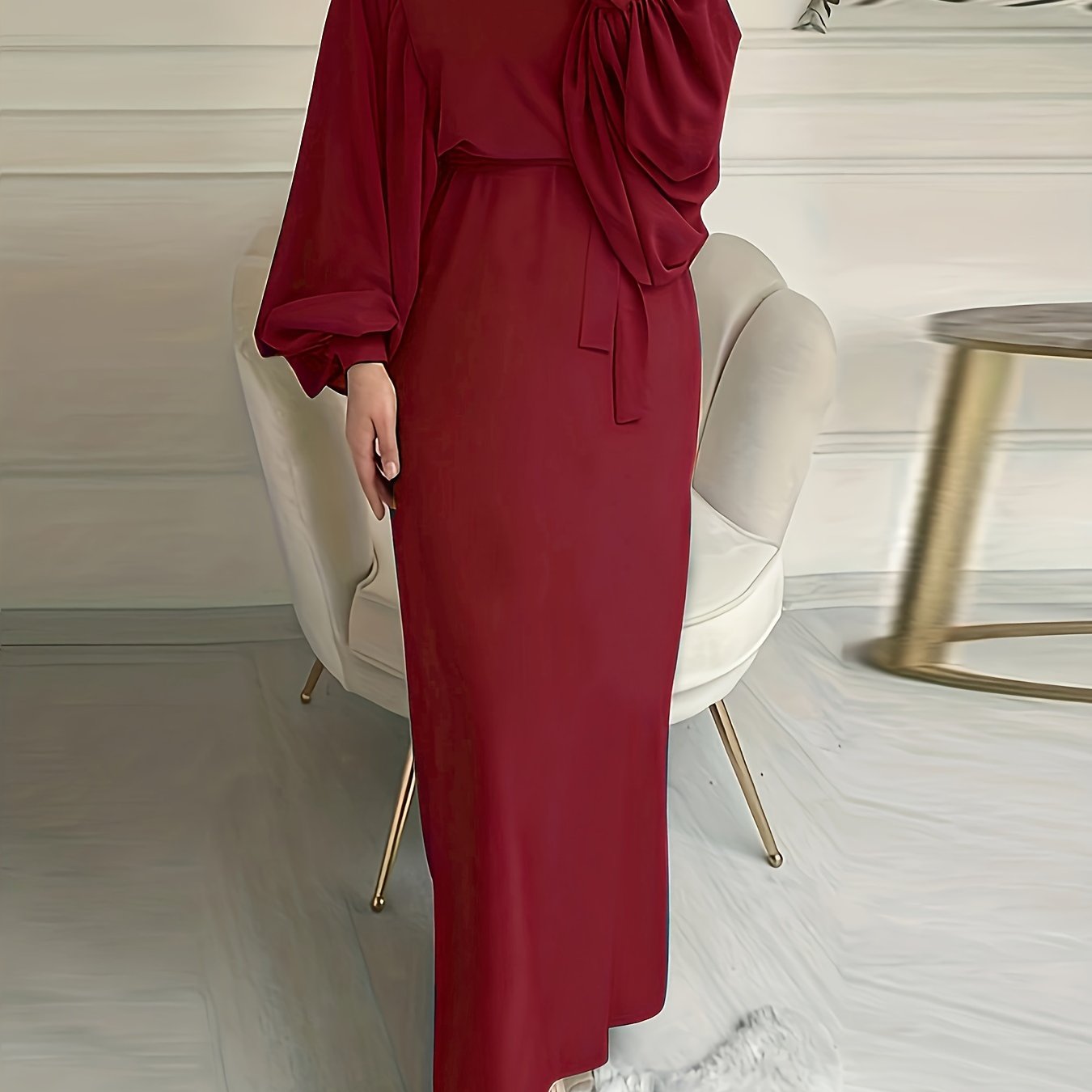 Elegant maxi abaya dress with solid tie waist and lantern sleeves.