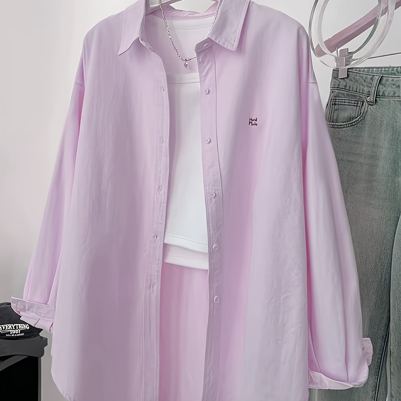 Women's embroidered long sleeve shirt made of 100% polyester woven fabric, 120g/m², with lapel collar. Loose fit sun protection top for spring/summer fashion.