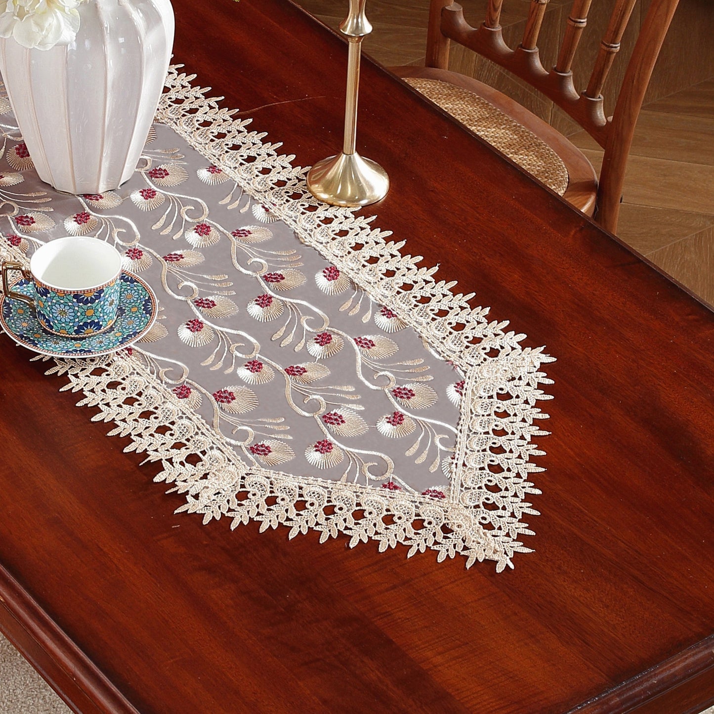 Polyester embroidered table runner for holiday and wedding decor.