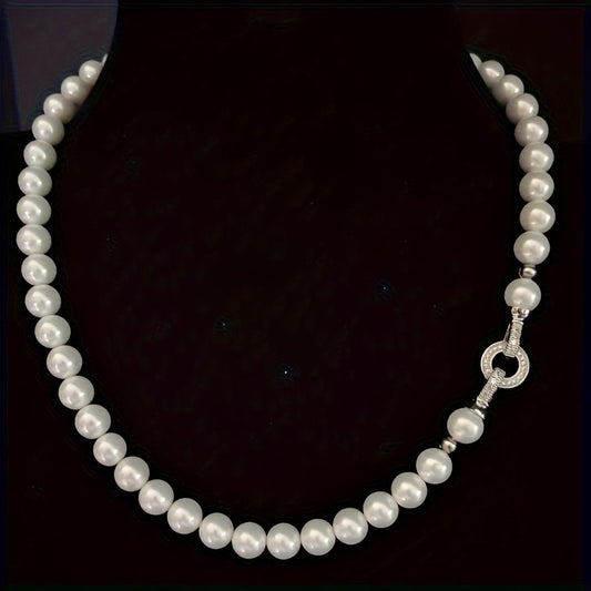 Impeccably crafted from natural freshwater pearls measuring 7-8mm, this stunning necklace features a silvery diamond round buckle. Presented in an elegant gift box, it is suitable for both male and female recipients and perfect for everyday wear