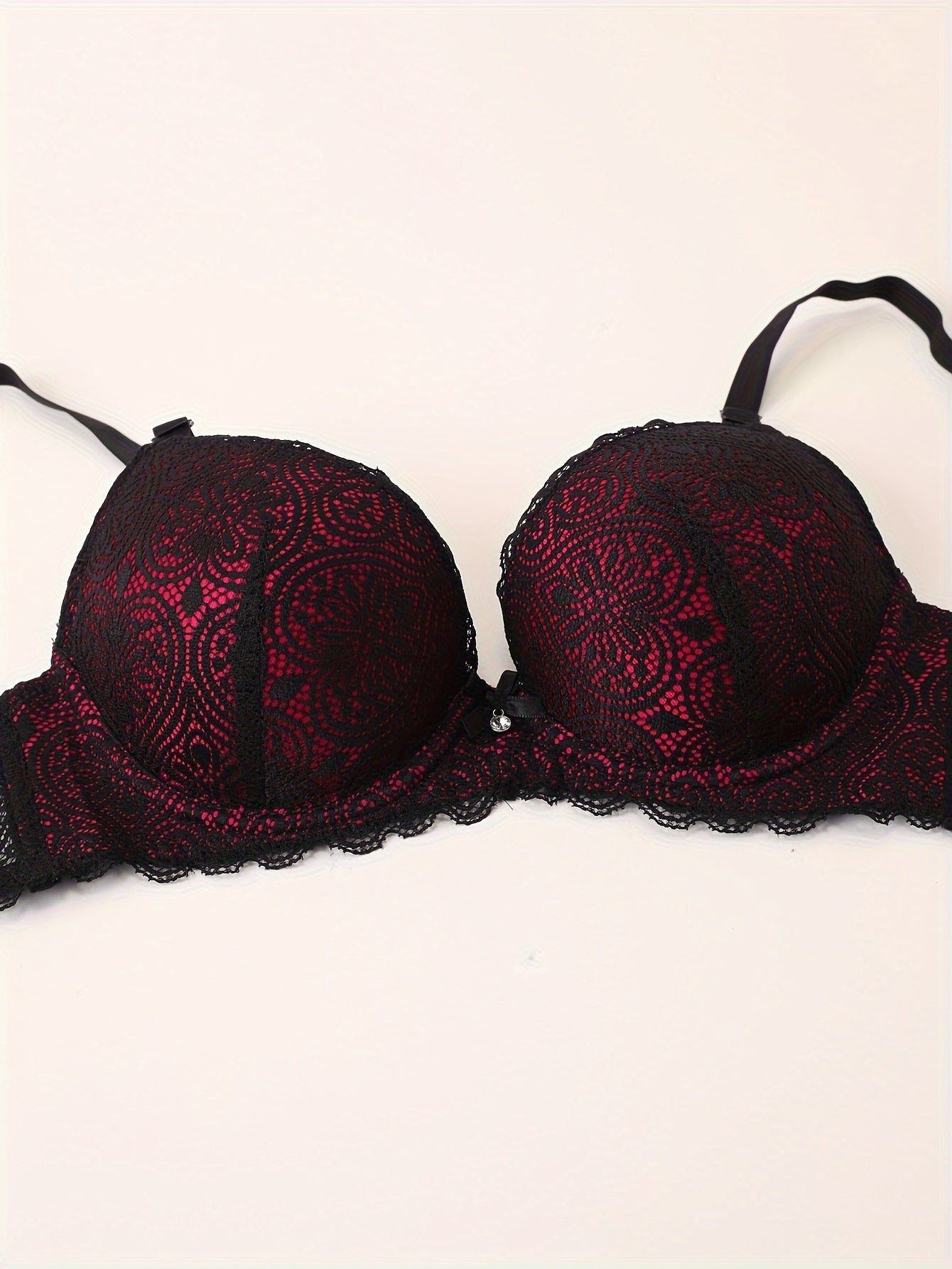 Lace bra and panties vs. push-up bra with bow tie and colorblock thong set for women.