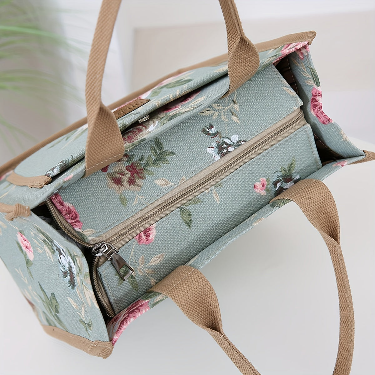 Stay stylish and organized with our versatile Canvas Lunch Bag, perfect for work, picnics, and travel. This insulated tote features a large capacity, trendy floral print, and is hand washable with mixed patterns. Keep your food fresh all day long with