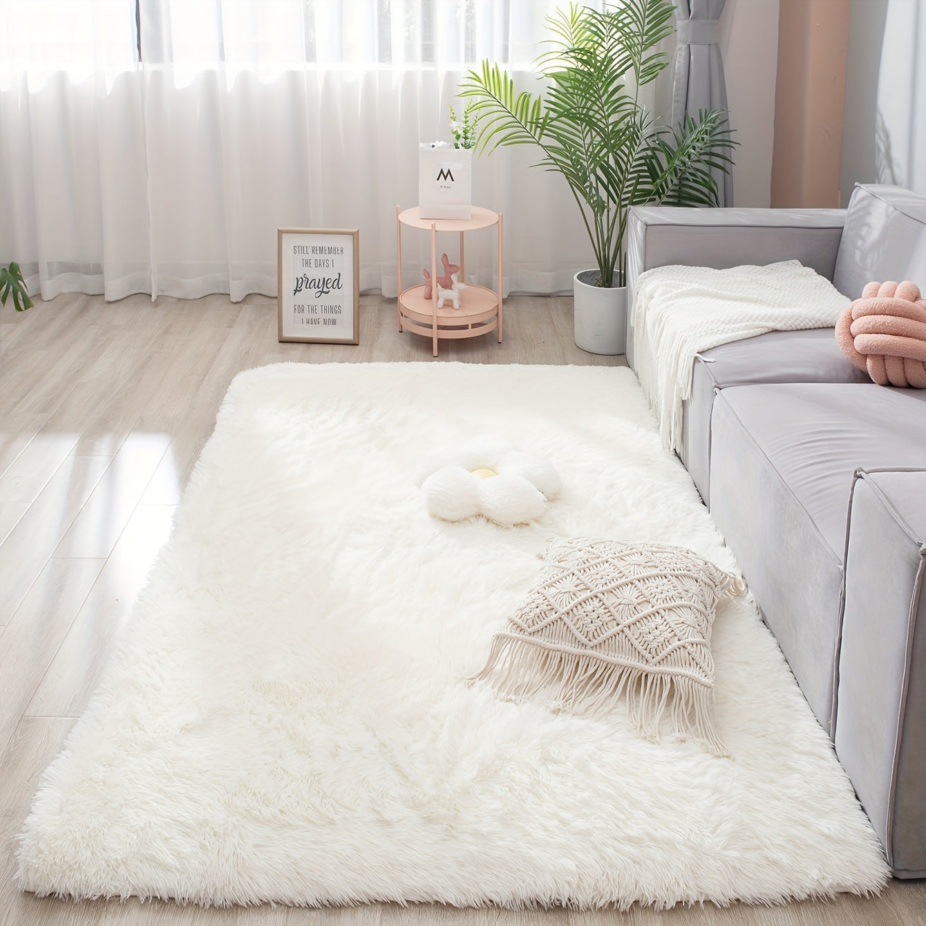 Soft and fluffy rectangle area rug perfect for your bedroom. This plush carpet is thick and non-slip, making it ideal for your living room. Made with machine-made polyester fiber, this low-pile rug is washable for easy cleaning. Perfect for indoor use.