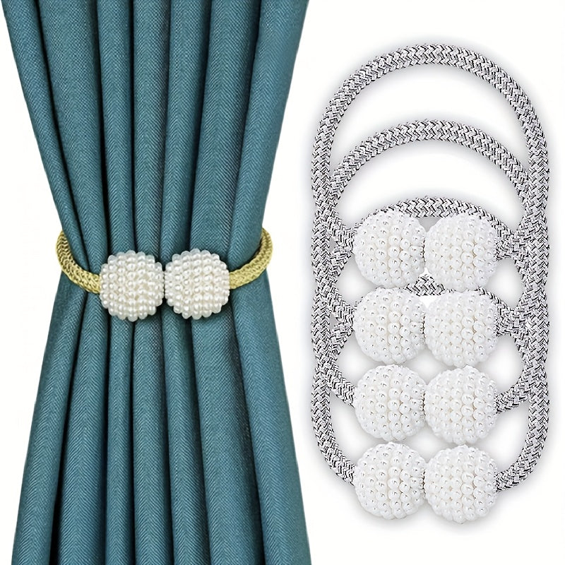 Decorate your home with these elegant Magnetic Curtain Tiebacks featuring faux pearl ball accents. Use them to hold back curtains and drapes in your bedroom or living room for a stylish and functional touch.