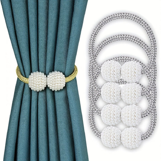 Decorate your home with these elegant Magnetic Curtain Tiebacks featuring faux pearl ball accents. Use them to hold back curtains and drapes in your bedroom or living room for a stylish and functional touch.