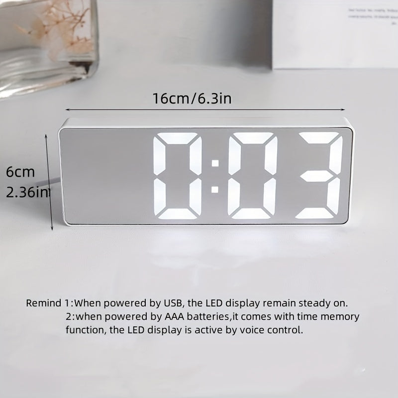 Digital clock with large LED display, mirror surface, dual brightness levels, and battery or USB charging, ideal for home décor.