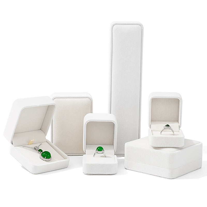 Elegant velvet jewelry box with cufflink compartment, classic design for rings, earrings, and necklaces. Soft fabric interior, available in multiple colors. Ideal gift packaging for special occasions.