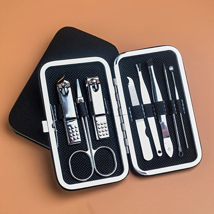 Manicure and pedicure set with nail clippers, files, ear spoon, and portable case for nail care at home or on-the-go.