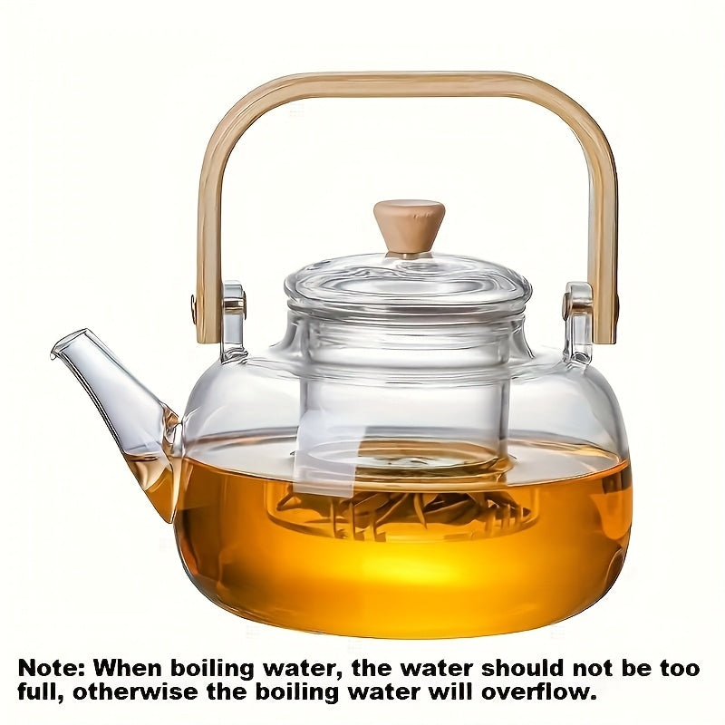 Glass teapot with bamboo handle and removable infuser, 34oz capacity. Made of heat-resistant clear borosilicate glass. Ideal for brewing loose leaf tea.