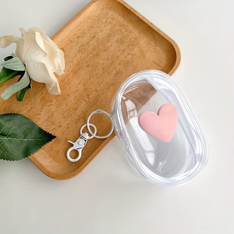 Waterproof heart-shaped PVC bag with keychain for organizing cables and headphones.