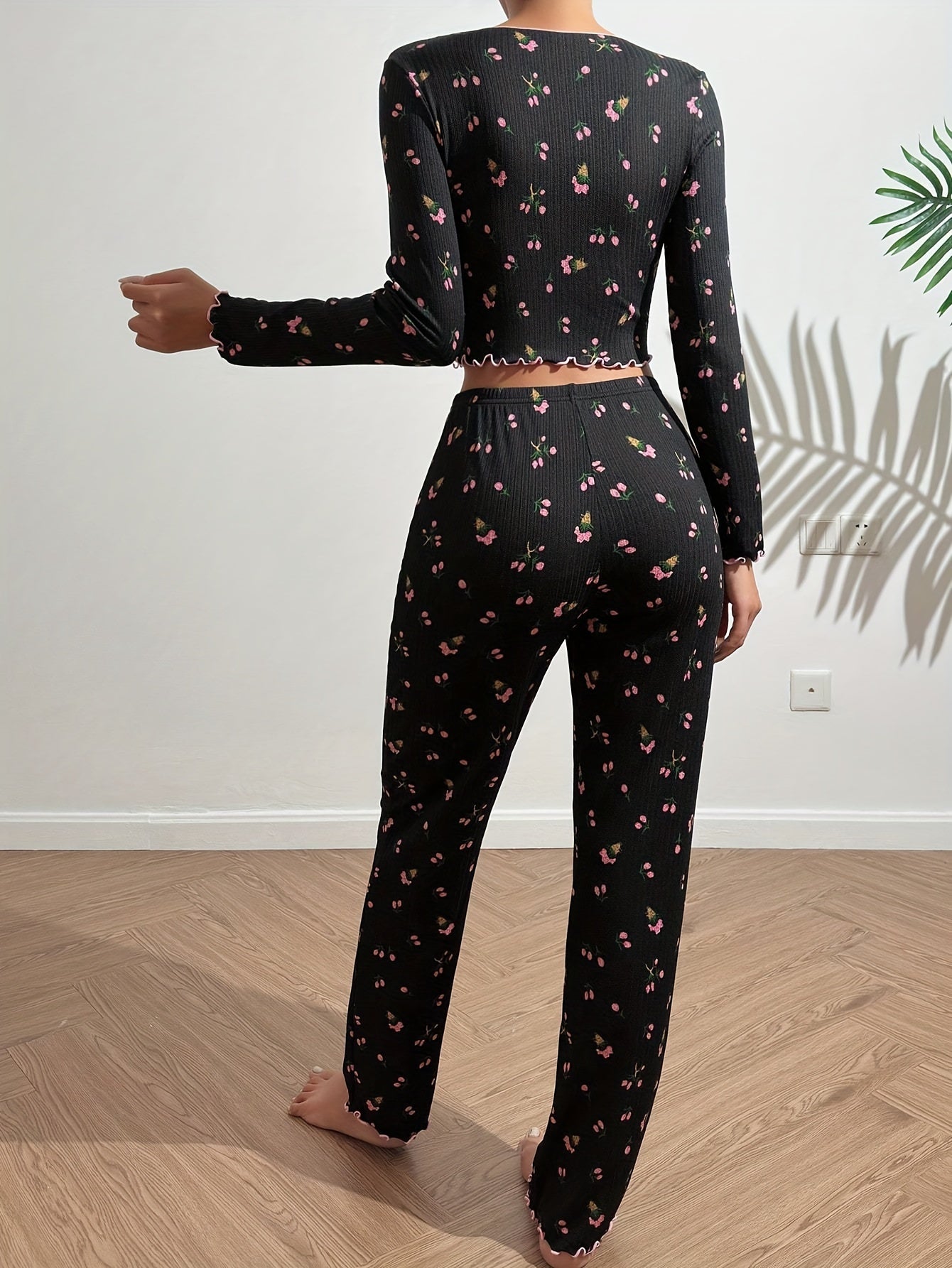 Floral print pajama set with bow detail, long sleeve top and ribbed pants in soft polyester blend - ideal for autumn nights