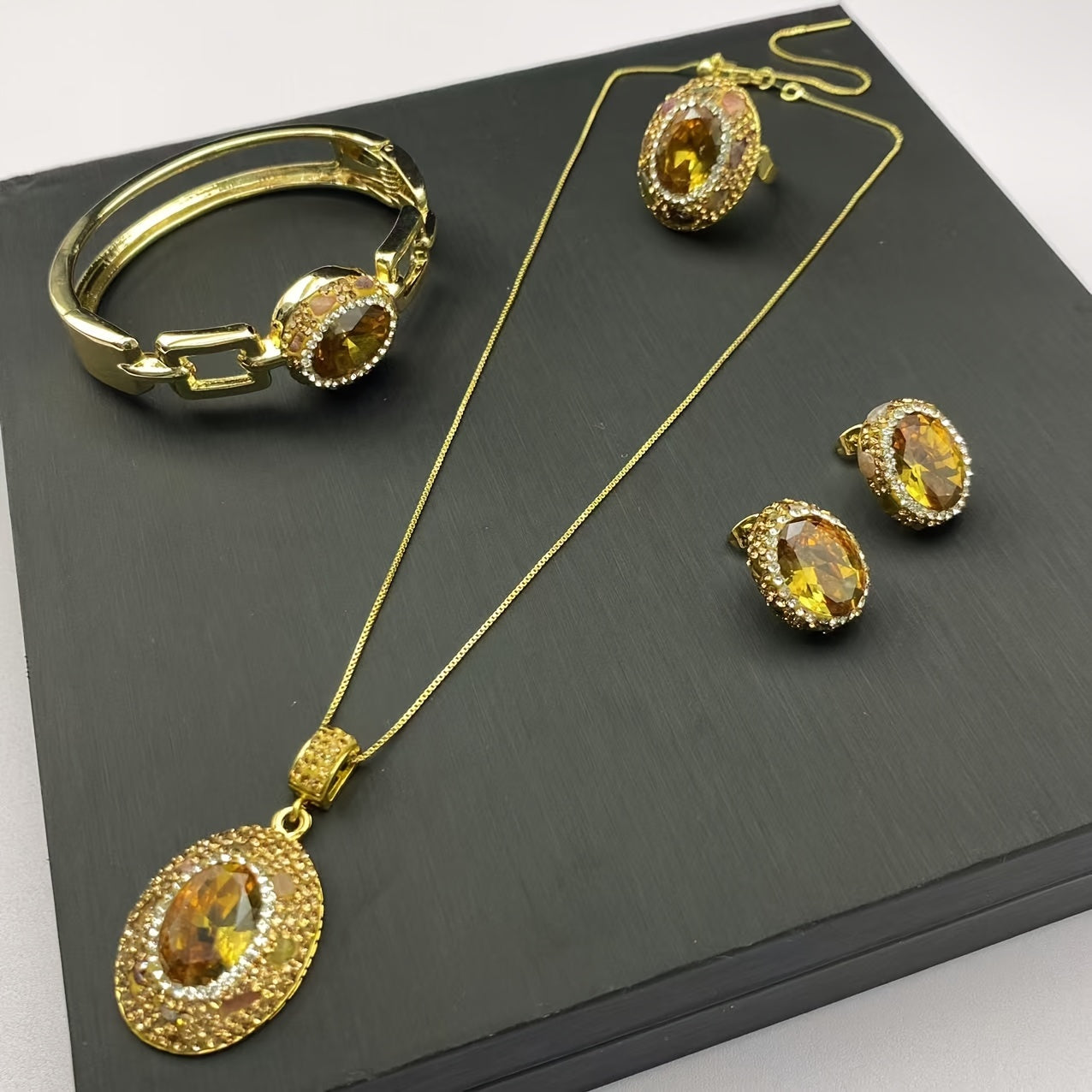 Vintage Tribal Style 18K Golden Plated Jewelry Set for Women, Made with Copper Alloy and Natural Stone - Includes Necklace, Earrings, Bracelet, and Ring. Handcrafted and Elegant, Perfect Gift for Ramadan and All-Season Wear.