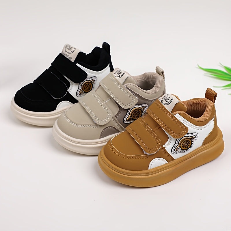 Casual low top sneakers for boys and girls with hook & loop closure, breathable faux upper, rubber sole, fabric insole, and round toe design.