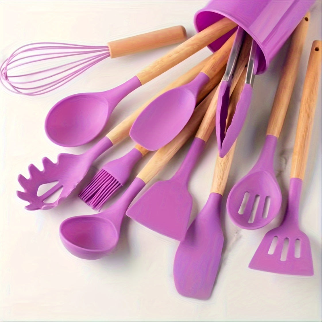 Set of 12 silicone utensils with khaki color and wooden handles, ensuring safety while cooking. These non-stick kitchen tools are washable and modern, providing a range of cookware and gadgets for your kitchen.