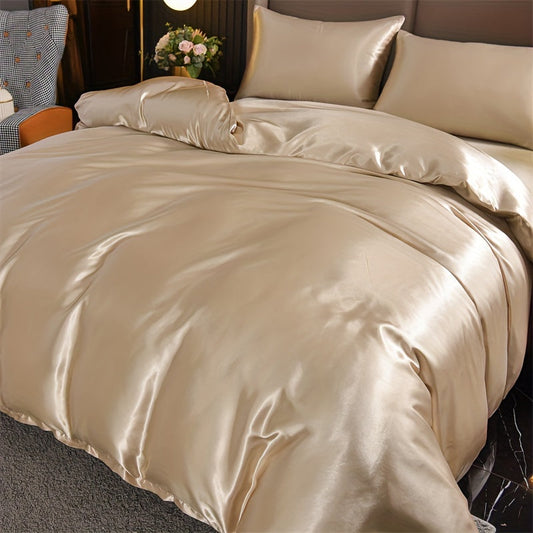 This luxurious Satin Duvet Cover Set includes 3 pieces and features a soft and comfortable design. The set includes a solid color Duvet Cover and 2 Pillowcases, perfect for any bedroom or guest room. Duvet Core not included.