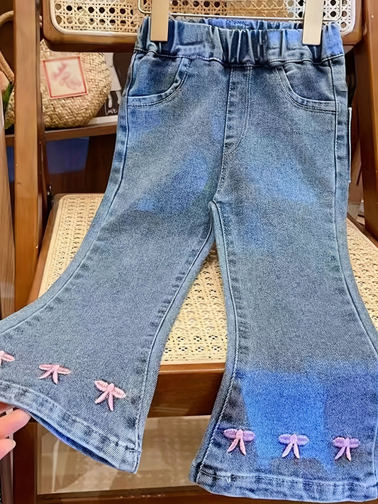 Cute bow-knot denim jeans for baby girls. Made with soft knit fabric, cotton blend, machine washable. Ideal for spring and fall.