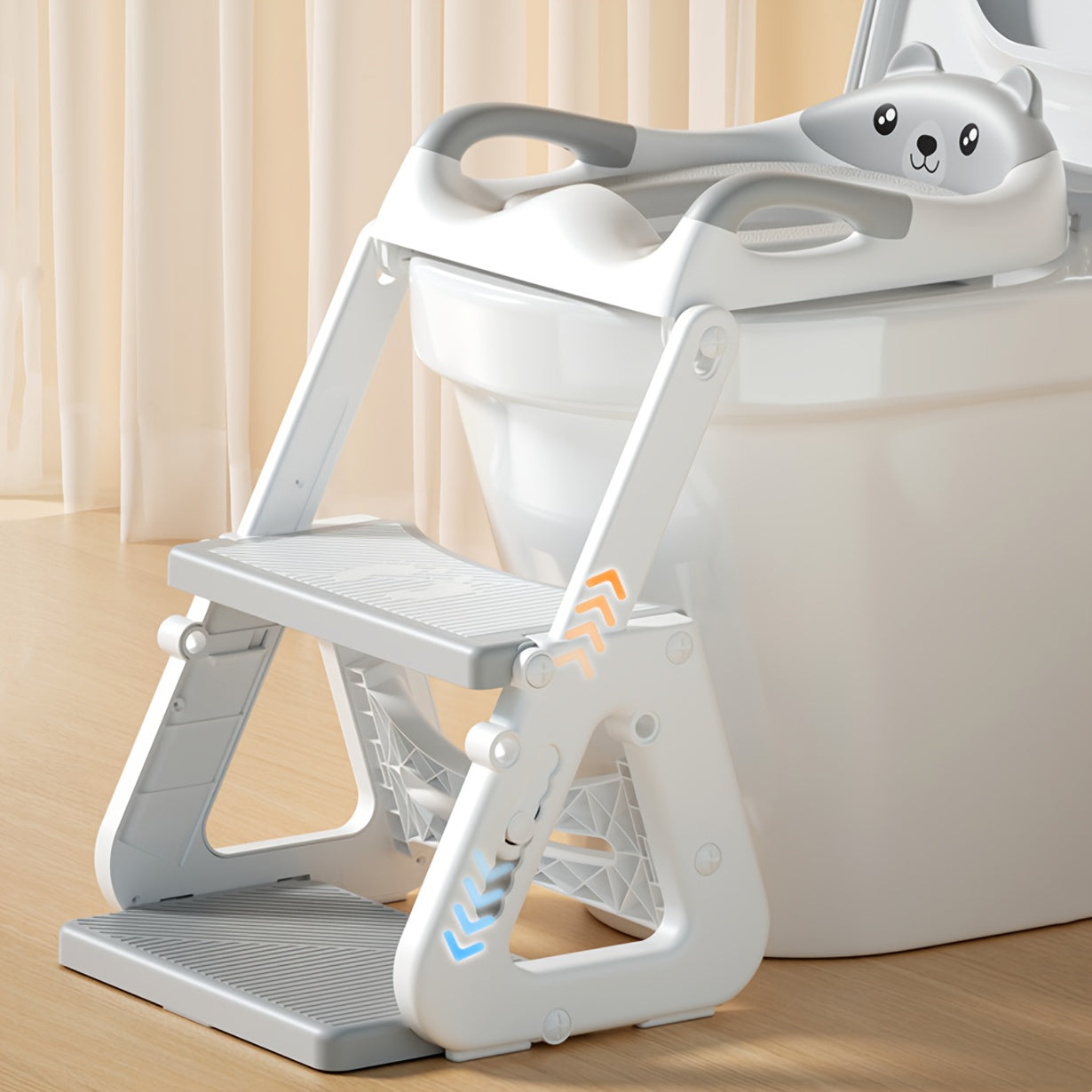 Versatile toilet training ladder for children, doubling as a folding footstool for the toilet, with a detachable toilet ring for added convenience.