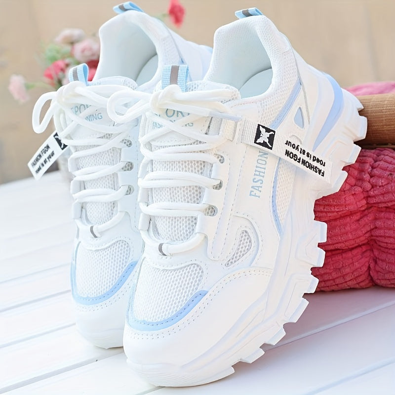 Women's white sneakers with low top lace-up, mesh upper, breathable fabric insole, and durable PVC sole for casual and sporty wear. Casual and trendy footwear.