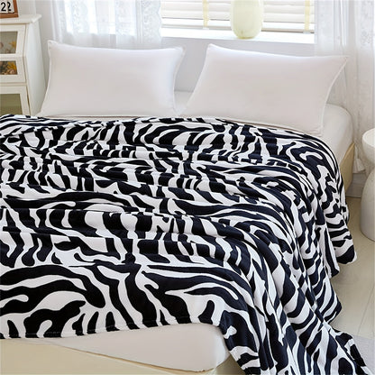 Zebra Patterned Blanket, Luxuriously Soft Throw Blanket Ideal for Snuggling Up on the Couch, Sofa, Office, Bed, Camping or Travel. The perfect multi-purpose gift blanket that can be used in all seasons.