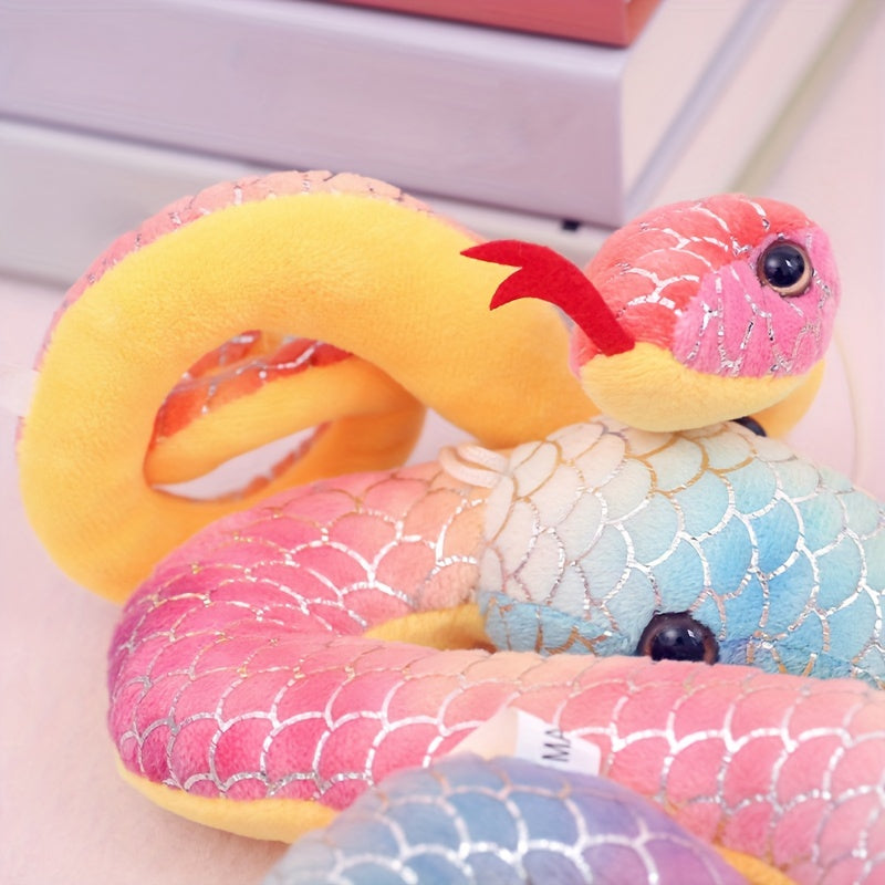 Soft cotton plush pendants in tie-dyed and gilded snake designs, perfect for celebrating the Year of The Snake. Suitable for ages 14 and up.