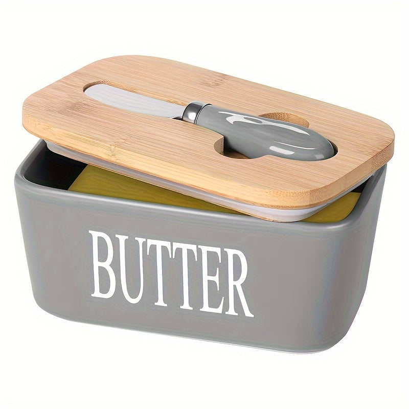 A complete set including a butter dish with a bamboo lid and butter knife, this large ceramic butter box is perfect for kitchen baking and gifting. It serves as an airtight butter keeper container for countertop or refrigerator storage. Ideal for home