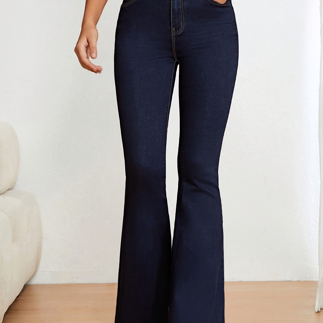 Blue stretch denim flare jeans for women, slim fit, high-waisted with button closure, machine washable.