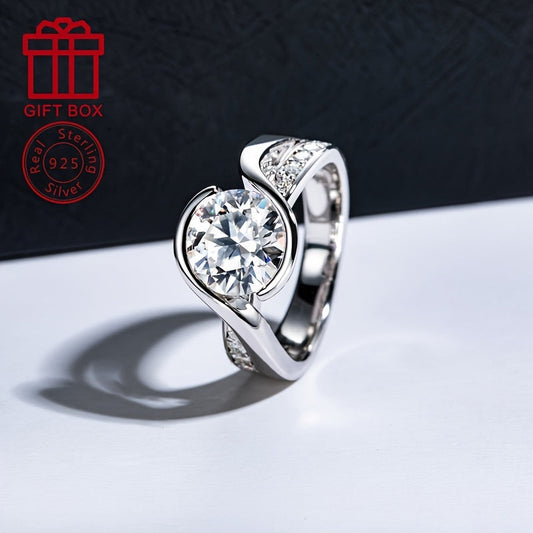 This elegant women's ring features a 9.0mm half-set moissanite stone, surrounded by 3CT accent stones totaling approximately 0.027CT each. Made from 925 silvery metal, the ring weighs approximately 6.2g and is perfect for weddings, engagements