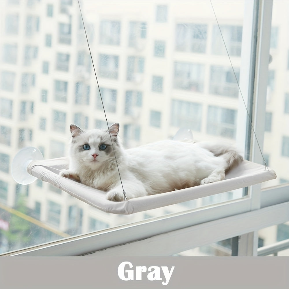 A versatile window-mounted cat hammock that is detachable, washable, and perfect for indoor cats. Specifically designed to serve as a comfortable cushion for windowsills or bedside cabinets.