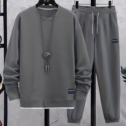 Men's casual gray waffle knit sweatsuit set with "KINDERGARTEN" patch, matching joggers, crew neck, elastic waistband and ankles, ideal for spring/fall.