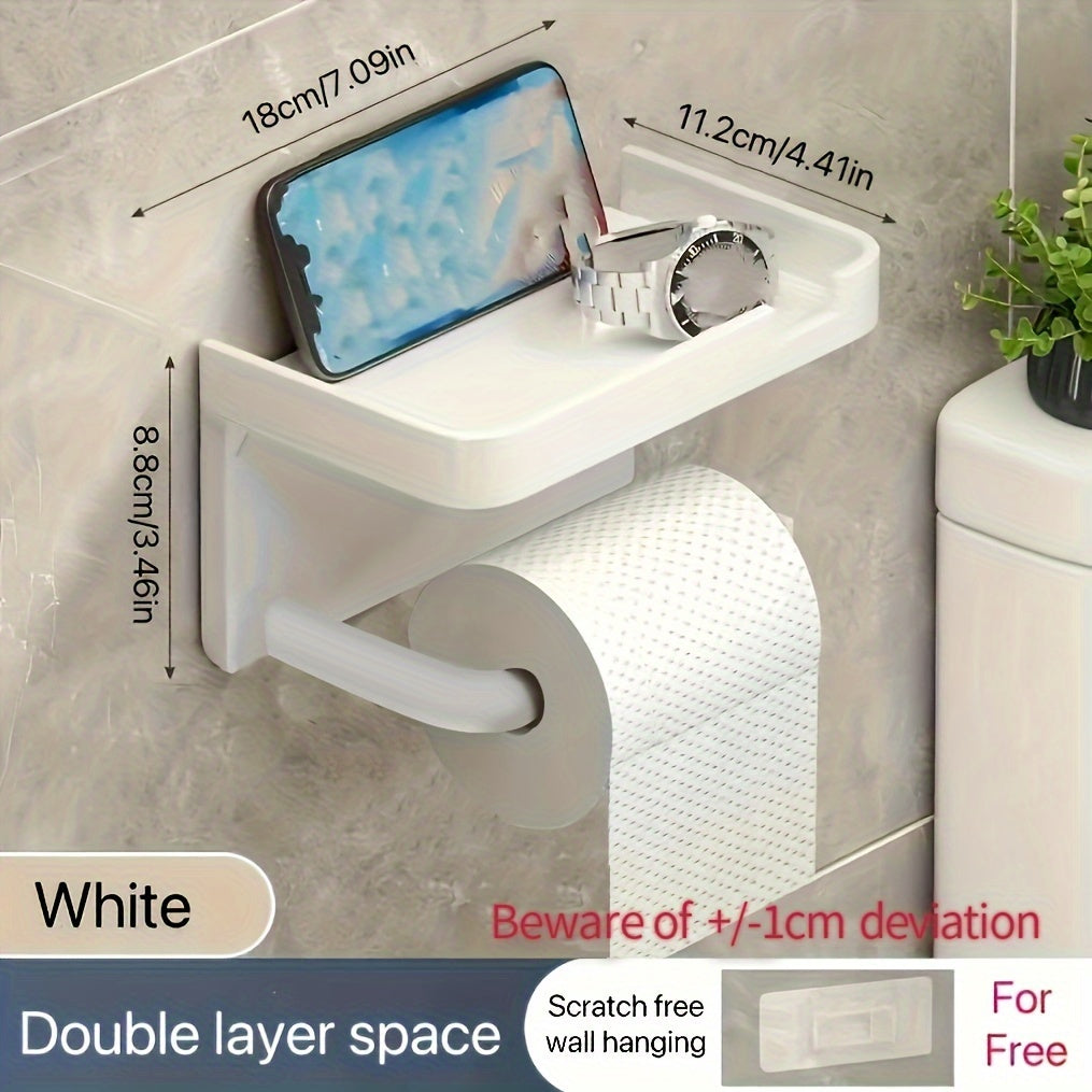 Wall-mounted toilet paper holder with shelf and phone holder, made of plastic, self-adhesive, no drilling required.