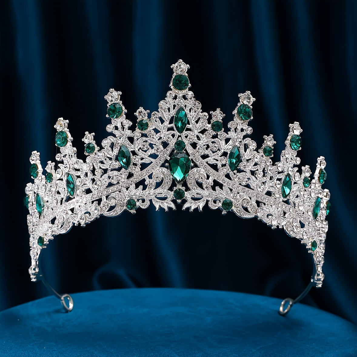 Silver alloy rhinestone tiara for elegant weddings and parties.